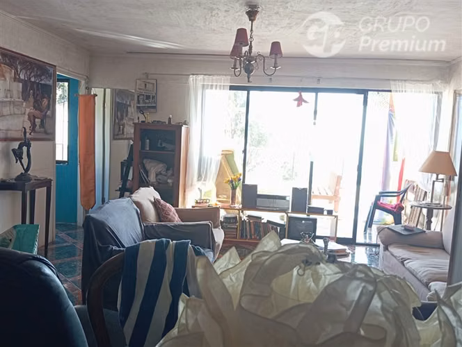Terreno con tres casas en venta