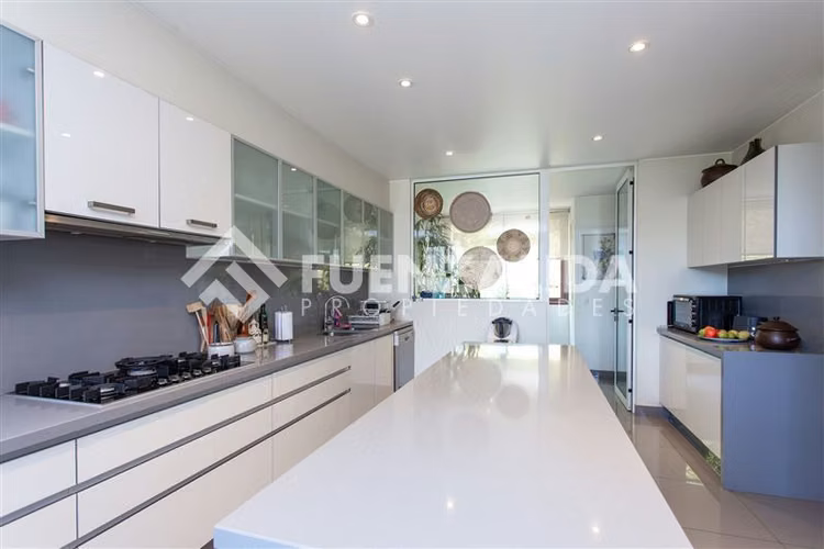Venta depto San Damian, 3 dorm, con jardín uso exclusivo.