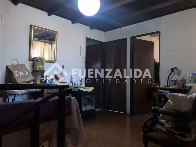 Casa con locales comerciales en Av. Macul