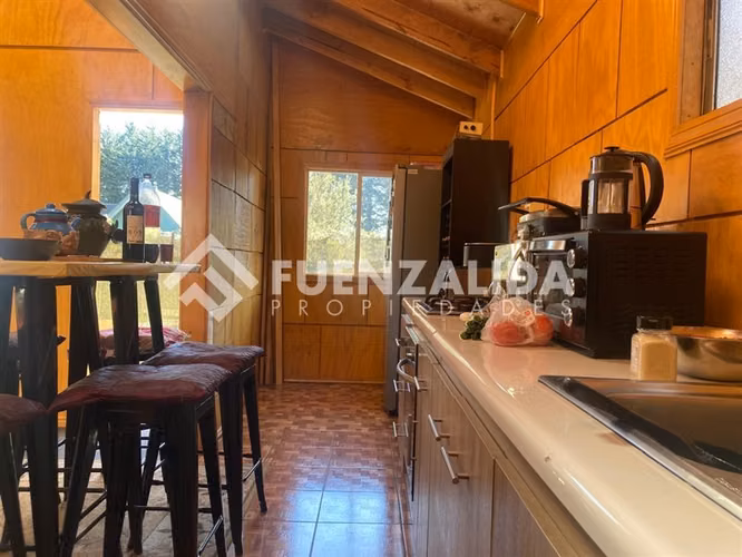Parcela 5000 mts2 con 2 casas y 5 cabañas en Piedra Azul