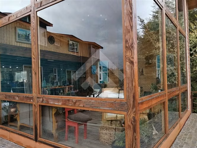 Casa en venta de 7D. en Calbuco, 6,85 Ha con cabañas y tinas
