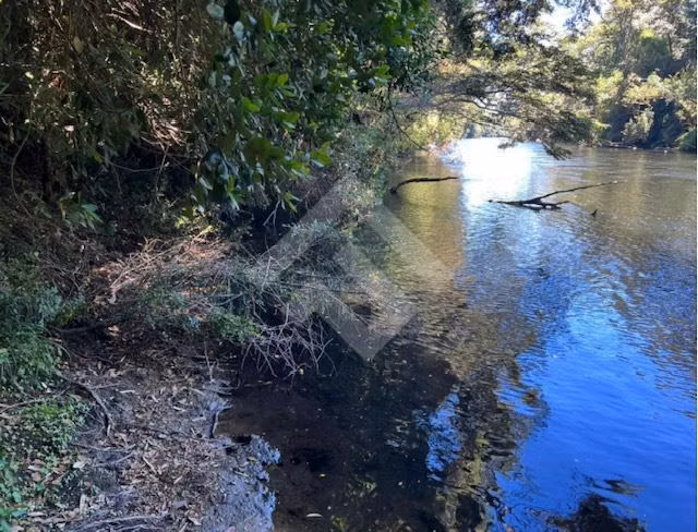 TERRENO DE 7 HECTAREAS SECTOR LA QUEMAS CON ORILLA DE RIO