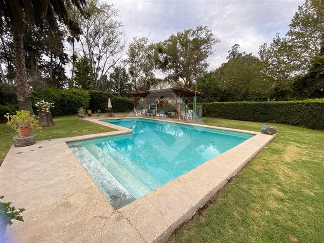 Parcela con 3 casas piscina quincho vendo en Talagante