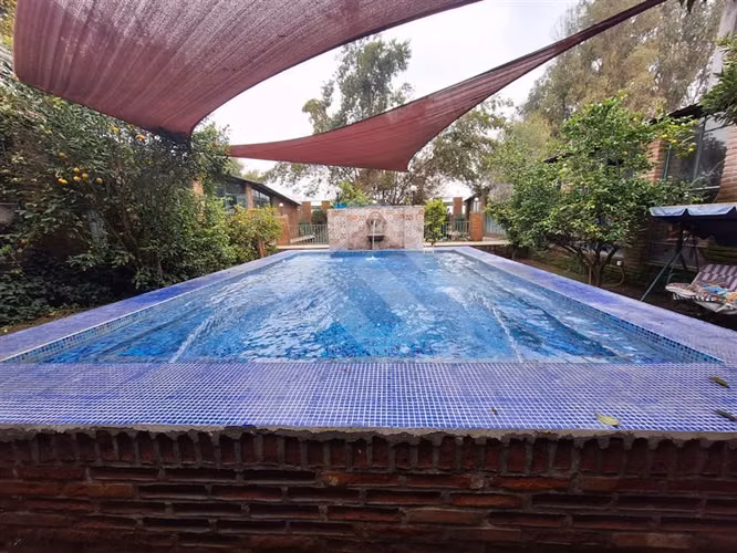 Parcela en venta en Padre Hurtado con dos casas
