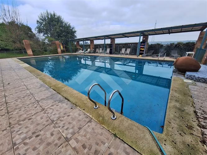 Parcela en venta en Padre Hurtado con dos casas
