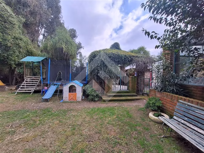 Parcela en venta en Padre Hurtado con dos casas