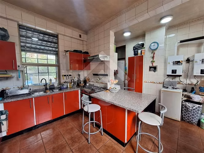 Parcela en venta en Padre Hurtado con dos casas