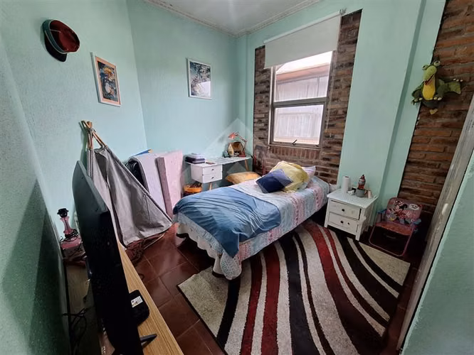 Parcela en venta en Padre Hurtado con dos casas