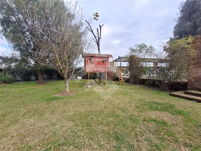 Parcela en venta en Padre Hurtado con dos casas