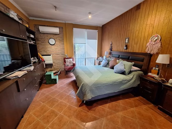 Parcela en venta en Padre Hurtado con dos casas