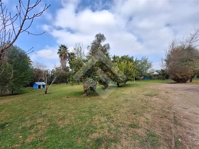 Parcela en venta en Padre Hurtado con dos casas