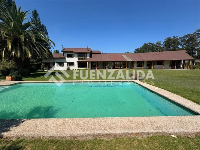 2 casas en venta en parcela de 5000 mts . Cond. Consolidado