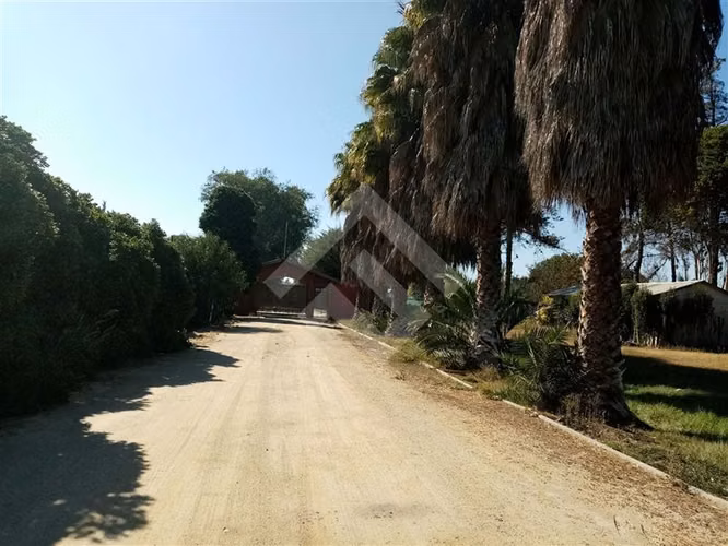 Parcela con casa 2 piscinas Condominio en venta en Talagante