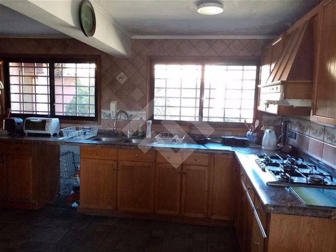 Parcela con casa 2 piscinas Condominio en venta en Talagante