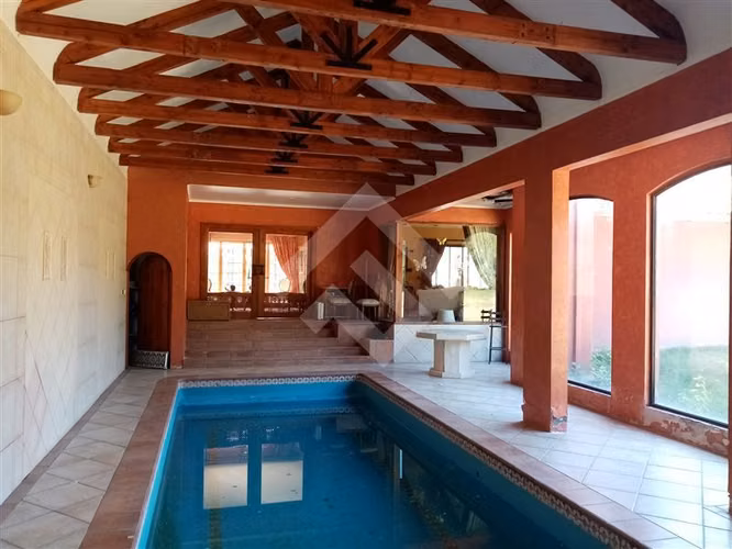 Parcela con casa 2 piscinas Condominio en venta en Talagante