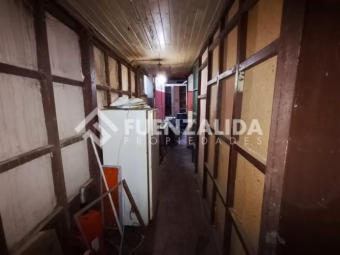 Venta sitio casa y local comercial, centro en Concepción