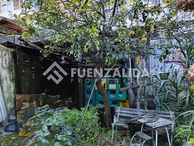 Venta sitio casa y local comercial, centro en Concepción