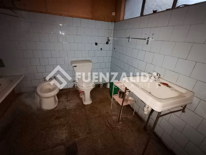 Venta sitio casa y local comercial, centro en Concepción