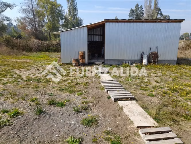 Parcela en venta con casa en Cabrero