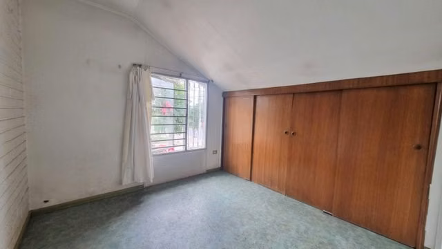 Casa Habitacional en La Florida / Walker Martínez