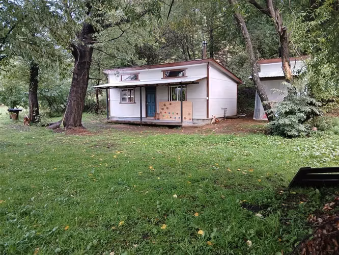 Parcela en venta en Coyhaique con casa mas quincho.