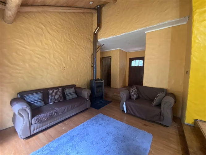 1 Hectarea con casas en camino internacional