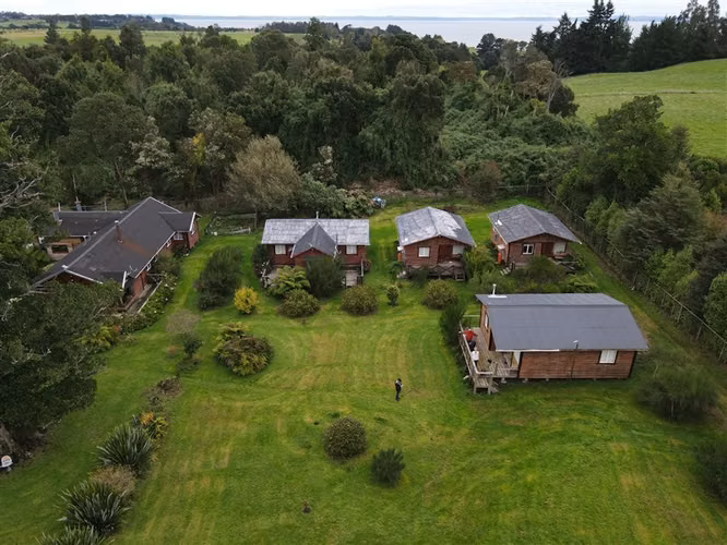 Parcela en venta con 4 cabañas Puerto Varas