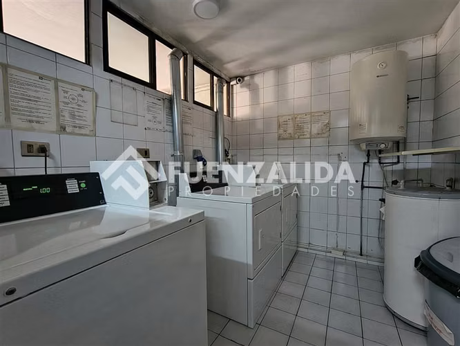 Departamento en venta de 2D-2B est y bod Metro Manquehue