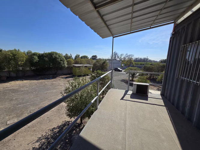 CALERA DE TAGO: PROPIEDAD 5.000 M2, CON PATIO ASFALTADO, 300 M2 OFIC. Y CASA CUIDADOR
