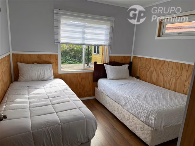 Venta Terreno 985m2 + 3 casas vista al mar en Cisnes. Dueño