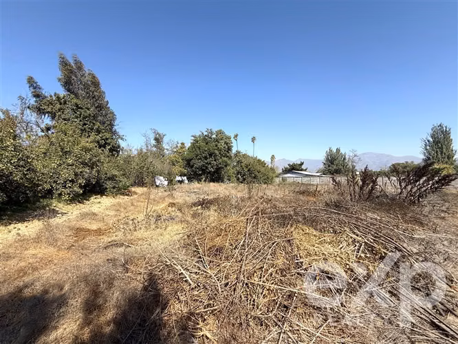 TERRENO ESTRATÉGICO A PASOS DE CONDOMINIOS Y EJE COMERCIAL