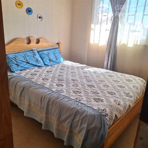 SE VENDE AMPLIA CASA EN BUIN 4D -1B ESTACIONAMIENTO TECHADO
