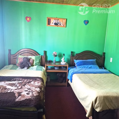 SE VENDE AMPLIA CASA EN BUIN 4D -1B ESTACIONAMIENTO TECHADO