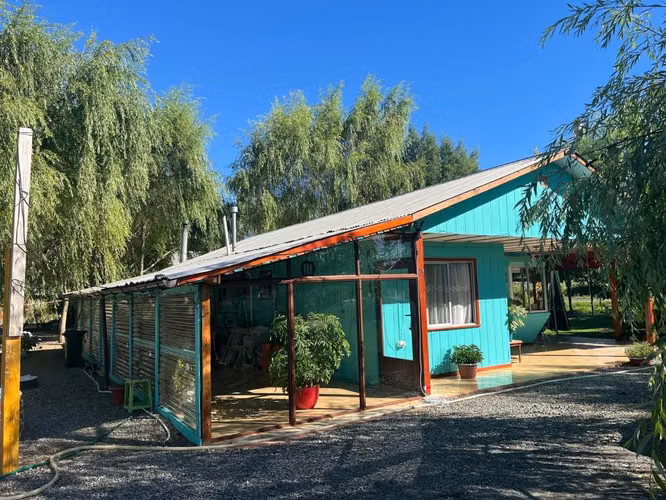 EN VENTA HERMOSA PARCELA CON CASA EN SECTOR AGUA BUENA - Imagen 14