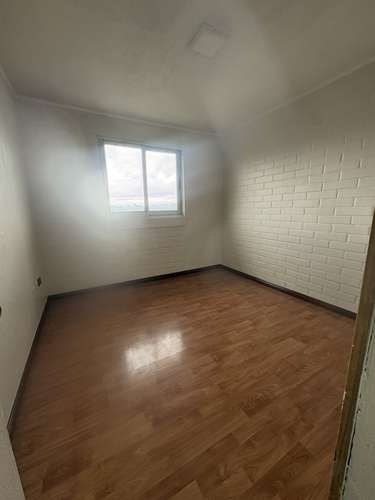 DEPTO 2D/1B/EST  EN PUDAHUEL, 4TO PISO CON BALCÓN - Imagen 10