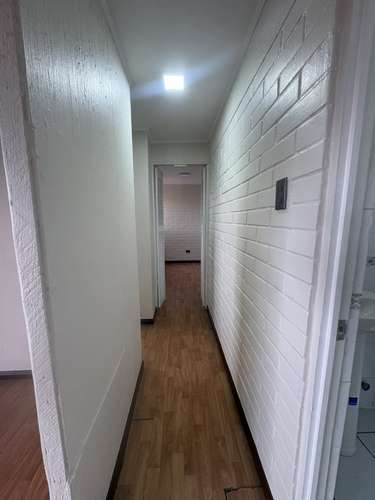 DEPTO 2D/1B/EST  EN PUDAHUEL, 4TO PISO CON BALCÓN - Imagen 11