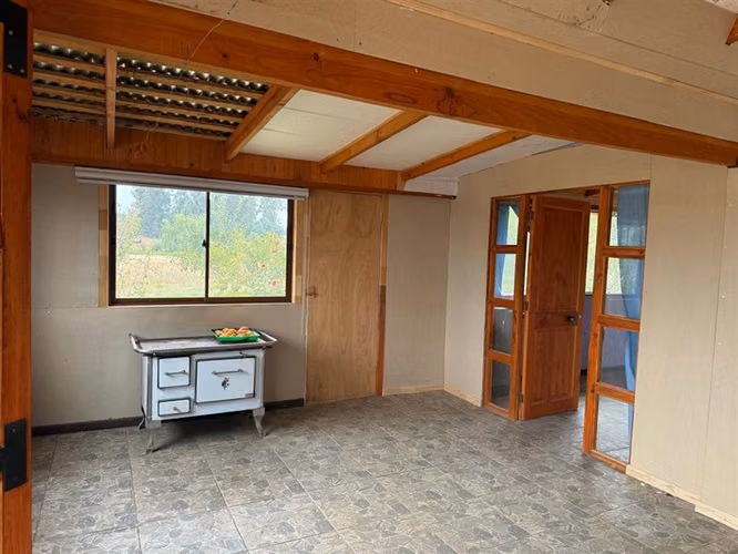 Se vende parcela 7.430 m2 con casa en Pelarco