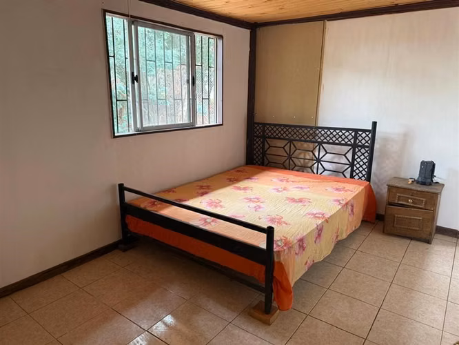 Se vende parcela 7.430 m2 con casa en Pelarco