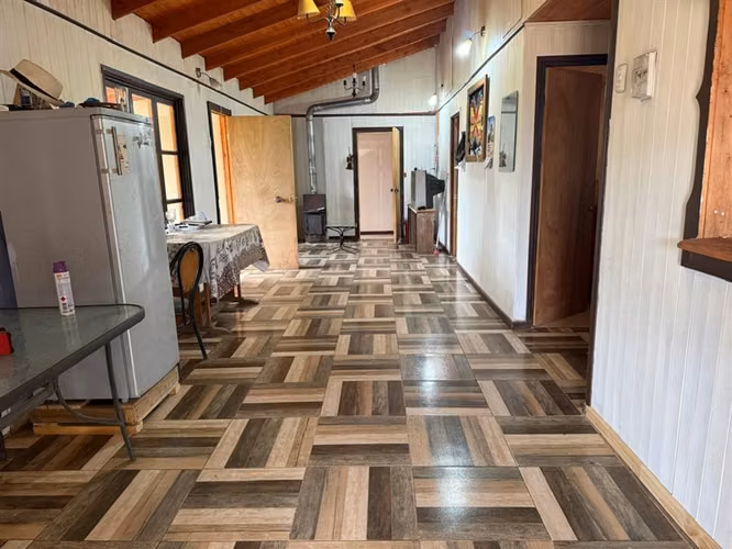 Se vende parcela 7.430 m2 con casa en Pelarco