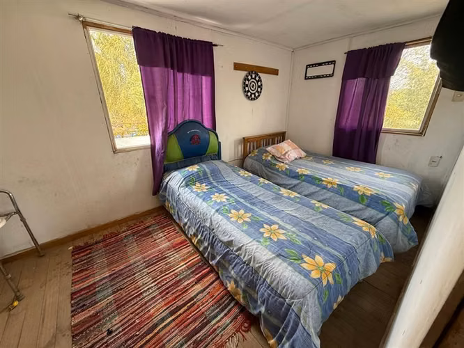 Se vende parcela con 2 casas independientes en Pelarco