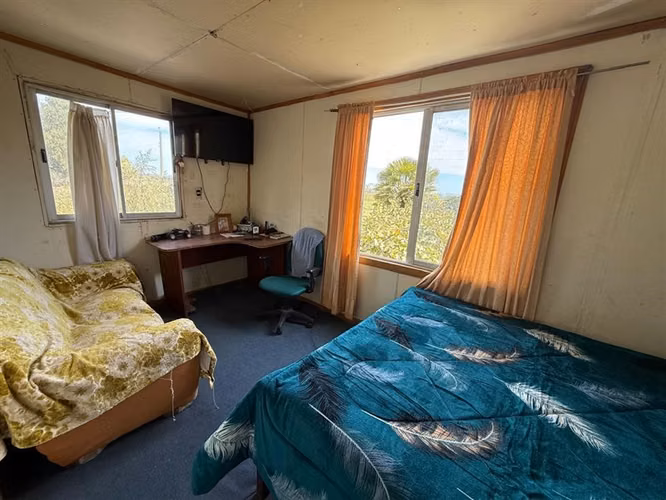 Se vende parcela con 2 casas independientes en Pelarco