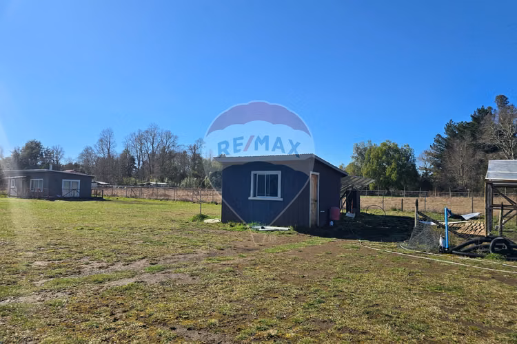 Venta parcela con casa y dos cabañas gran terreno