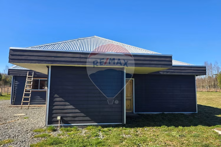 Venta parcela con casa y dos cabañas gran terreno