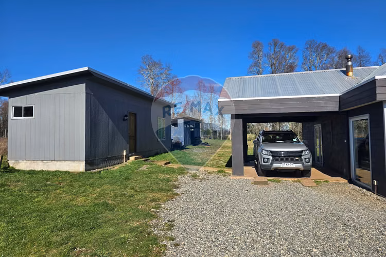 Venta parcela con casa y dos cabañas gran terreno