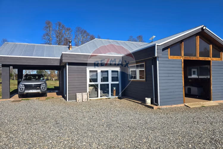Venta parcela con casa y dos cabañas gran terreno