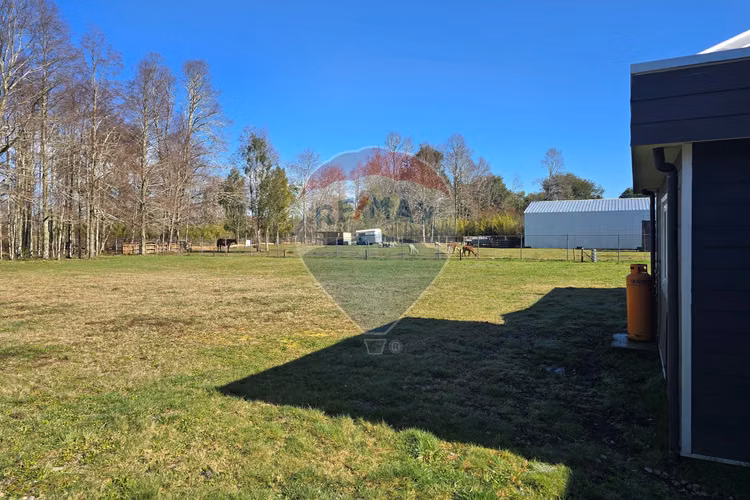 Venta parcela con casa y dos cabañas gran terreno