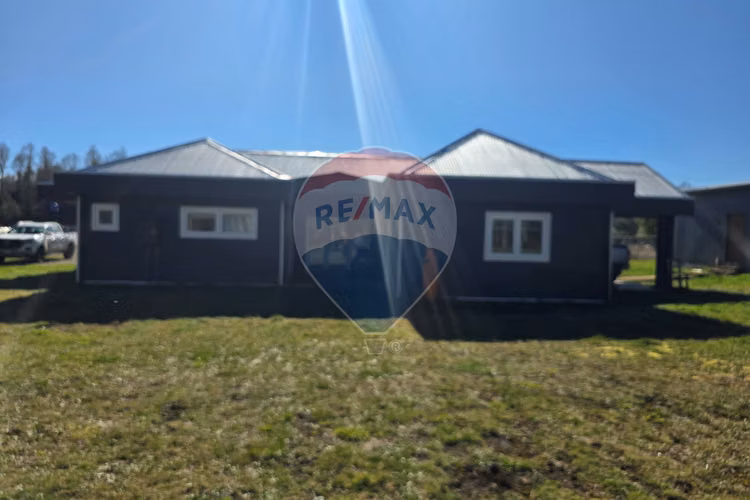 Venta parcela con casa y dos cabañas gran terreno