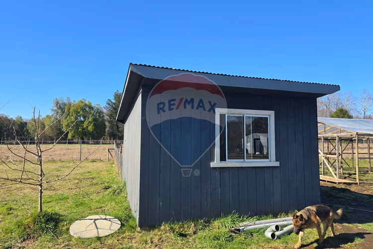 Venta parcela con casa y dos cabañas gran terreno