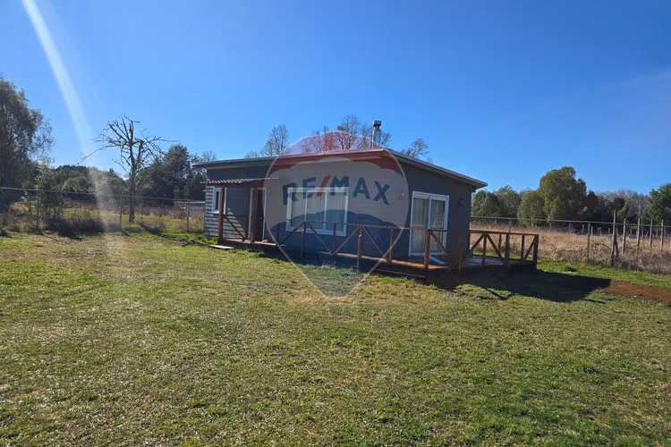 Venta parcela con casa y dos cabañas gran terreno