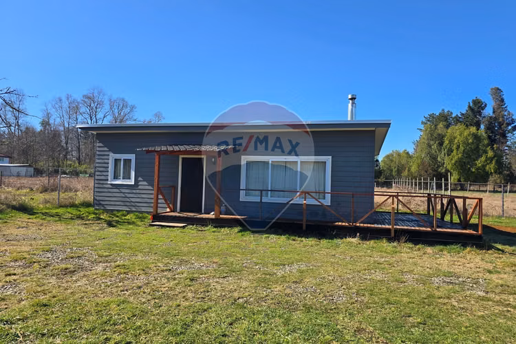 Venta parcela con casa y dos cabañas gran terreno